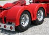 Semi Truck Fiberglass Double Hump Fender Set With Brackets Painted Red Close Up