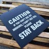 Polyguard Black "Caution If You Can't See My Mirrors, I Can't See You. Stay Back" 24" x 30" Mud Flap On Pallet