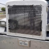 Peterbilt 379 Short Hood 430 Stainless Steel Grill With Alternating Oval Cut Outs on Truck