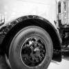 22.5" Alcoa Dura-Black Aluminum Wheel On Truck Close View