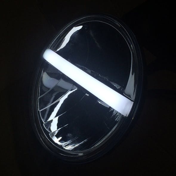 7" Round LED Headlight With Center DRL And Turn Signal - White LED