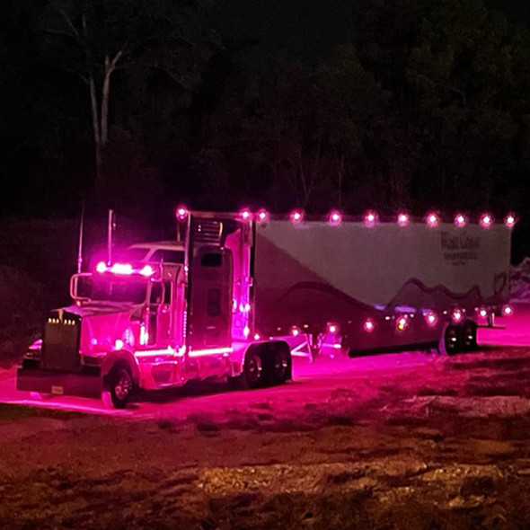 Kenworth Breast Cancer Awareness Dual Revolution Cab Light With Amber & Pink LED (Installed; On, Night)