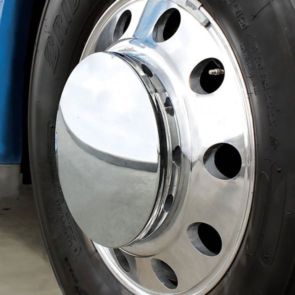 Chrome Moon Front Axle Cover W/ 33 mm Thread-On Nut Covers On Truck