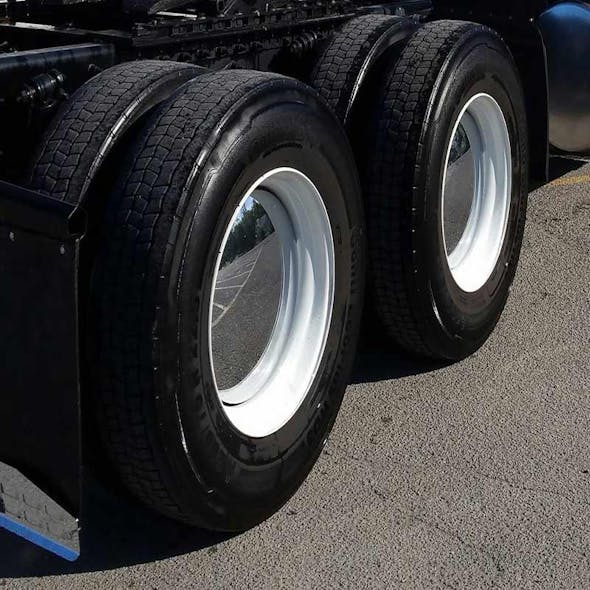 Moon Style Rear Axle Chrome Cover Kit - On Wheel Angled View