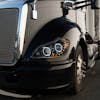 Kenworth T680 Blackout Headlight With Halo LED And Sequential Light Bar (Installed)