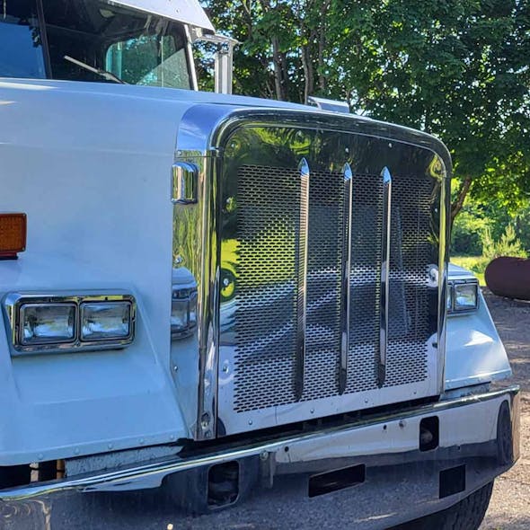 Freightliner Classic FLD 120 Logo Punch Grill Insert With 3 Grill Bars - installed angle close