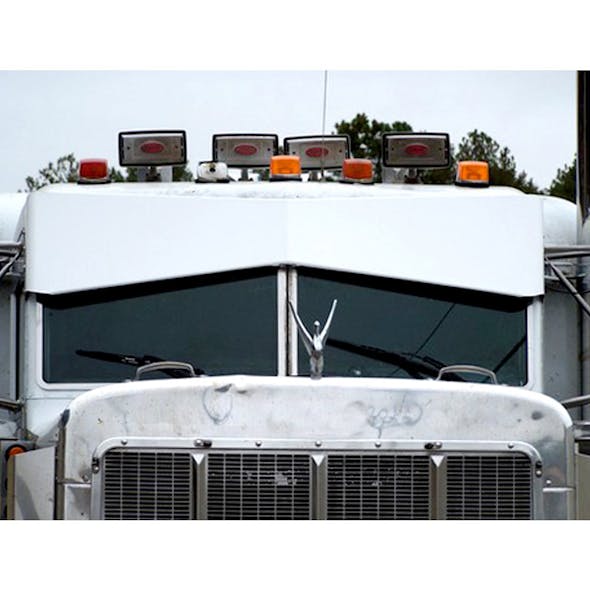 Peterbilt 379 386 388 389 Bowtie Visor By Talladega Fiberglass - Front view