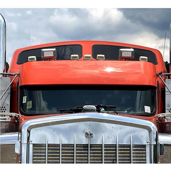 Kenworth W900 T660 T600 T800 Gangster Visor By Talladega Fiberglass - Mounted front view
