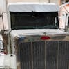 Peterbilt 589 High Roof One Piece 304 Stainless Steel Drop Visor Close Up View