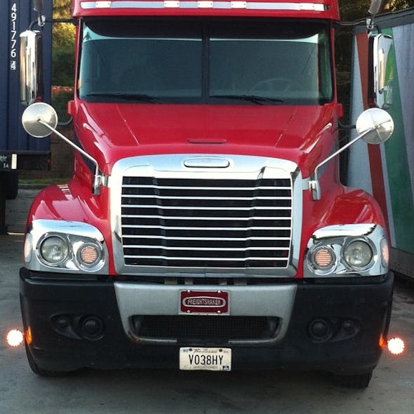 Freightliner Century Headlight Bezel Fender Trim On Truck - Front View